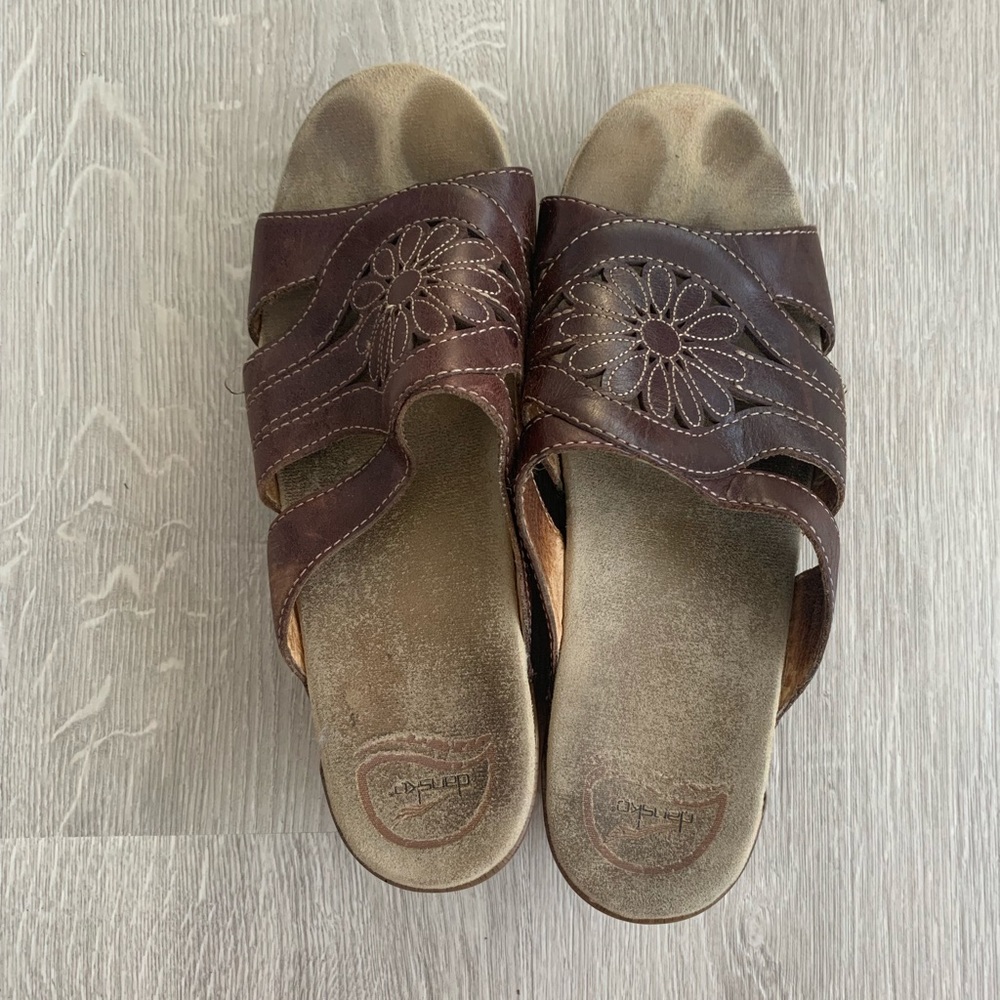 Dansko brown sandal clogs with flower stitching